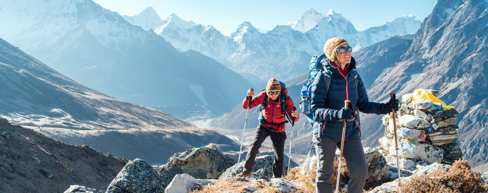 two hiking persons on the mountain